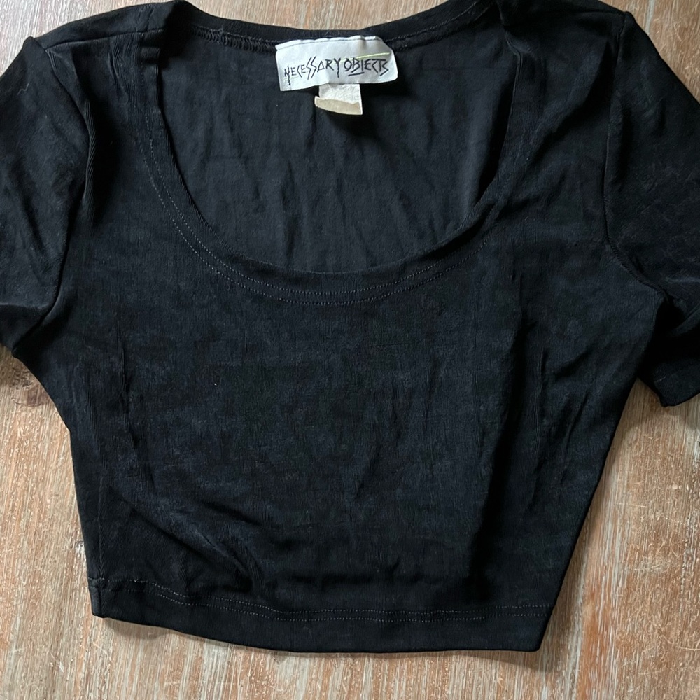 Necessary Objects Cropped rayon/nylon top in Black. Brand new,. Size Medium.
